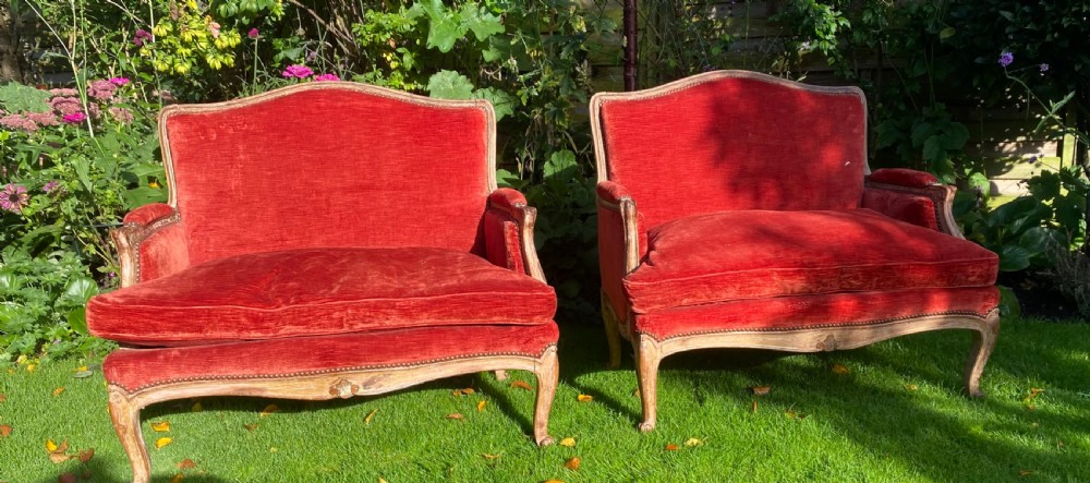 A pair of sofas in old rubbed paint finish with red velvet View III