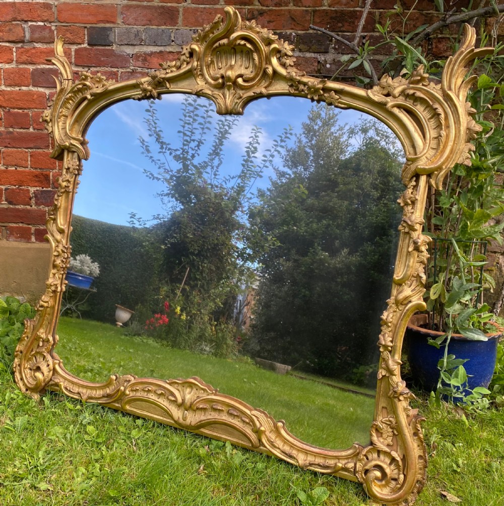 Carved gilt wood  early 19th Century mirror 