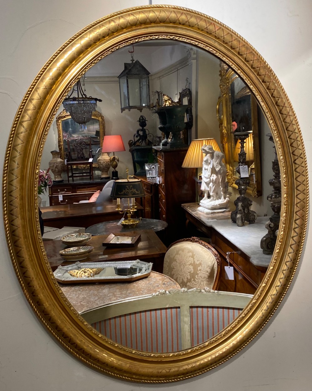 19th Century embossed gilt mirror 