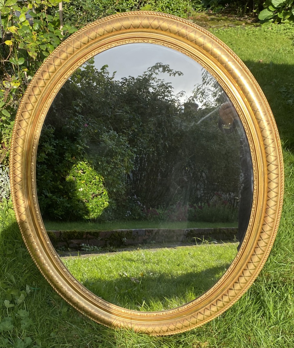 19th Century embossed gilt mirror  View II