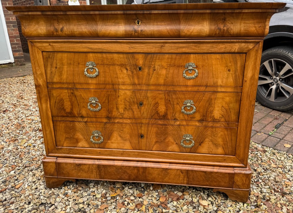 Early 19th Century figured walnut commode 