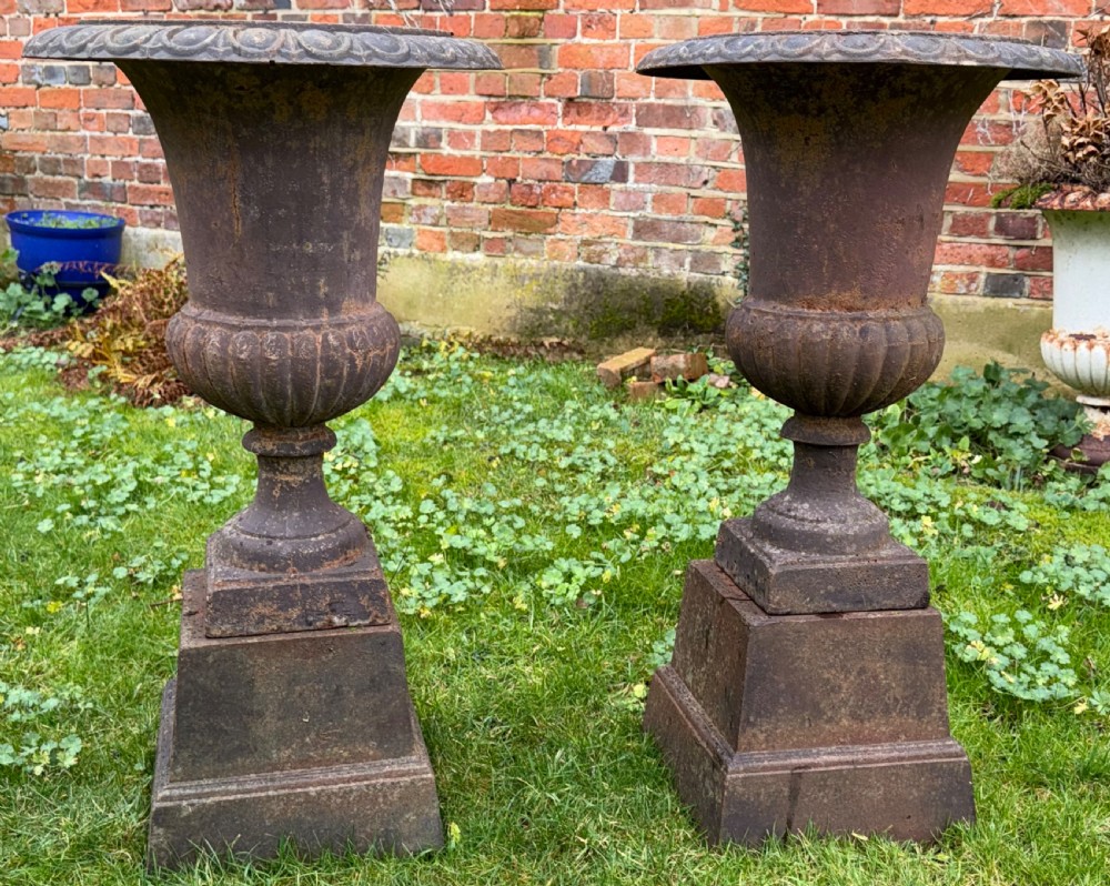 Pair of large cast iron garden pots 