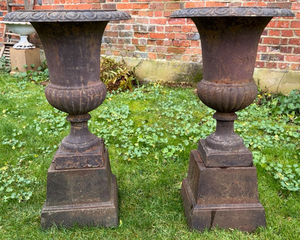 Pair of large cast iron garden pots  View III