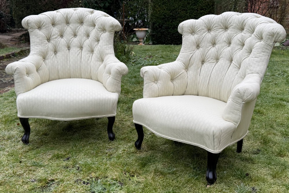 Pair of button back armchairs 