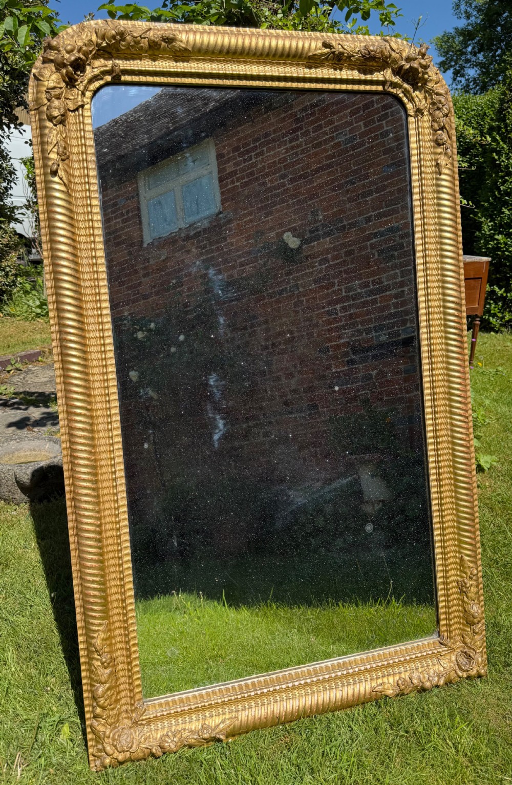 A French Louis Philippe ripple mirror in gilt View III