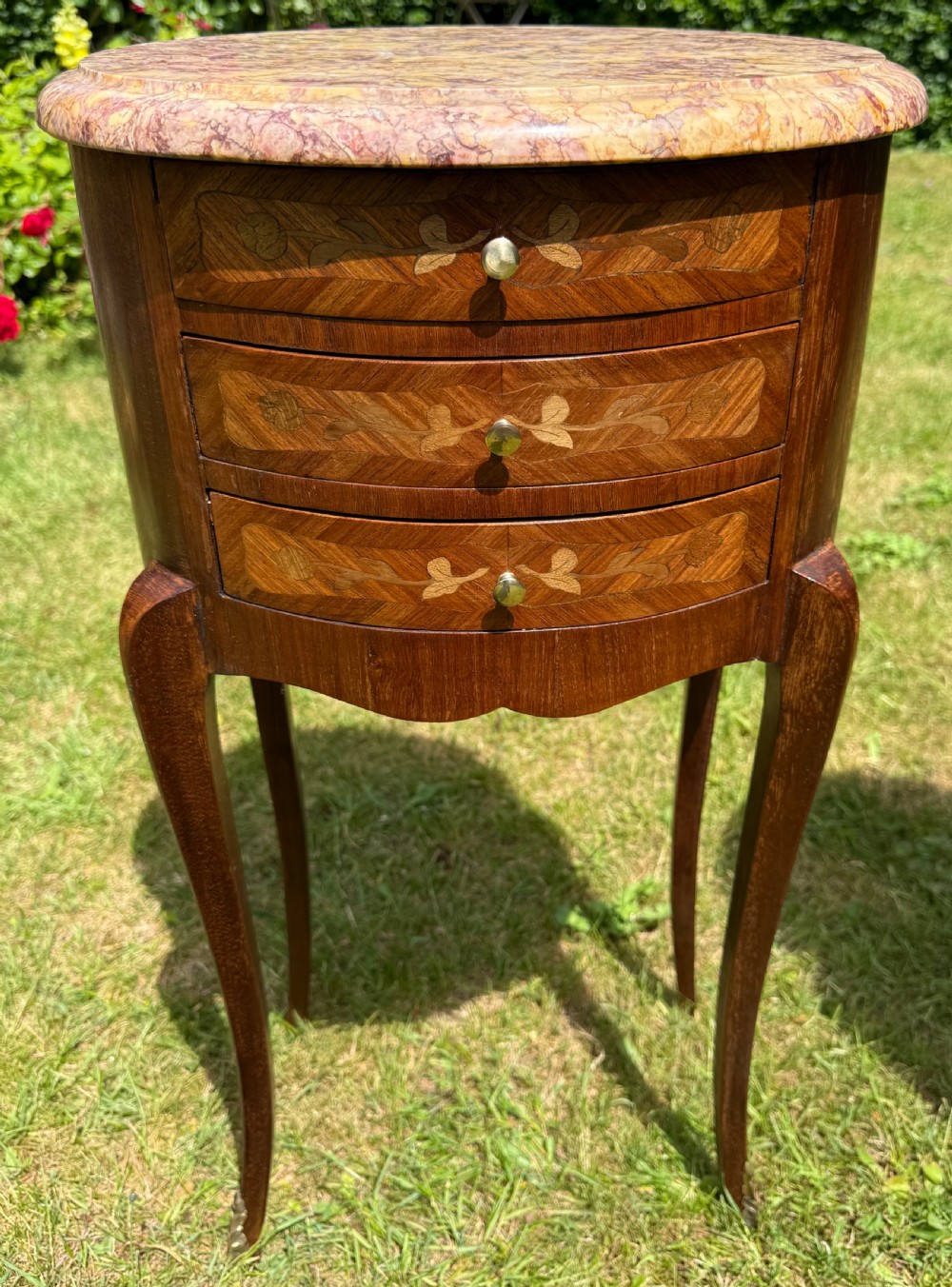 Pair of French oval marquetry bedside tables  View II