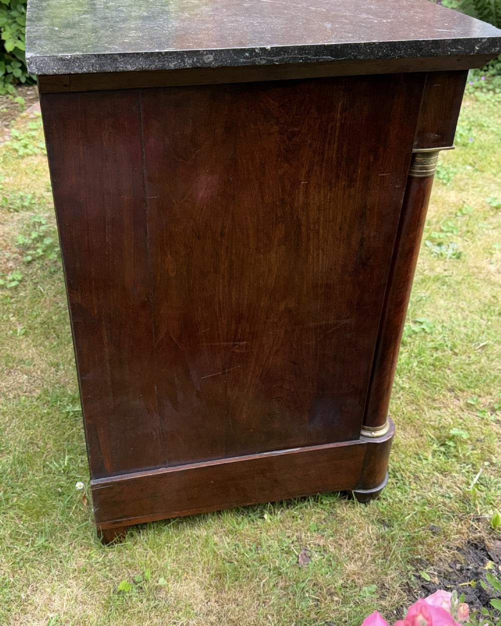 French Empire commode in flame mahogany  View II