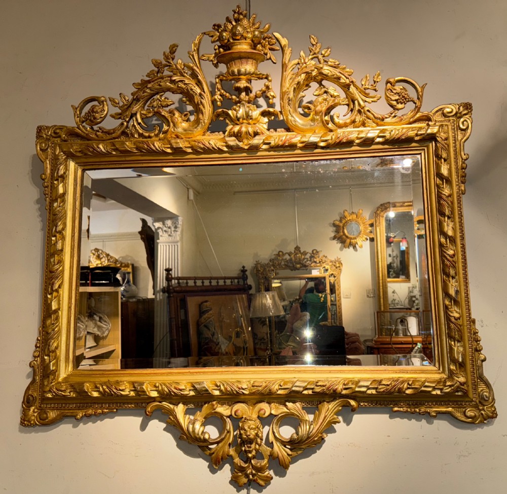 19th Century Baroque style mirror in gilt