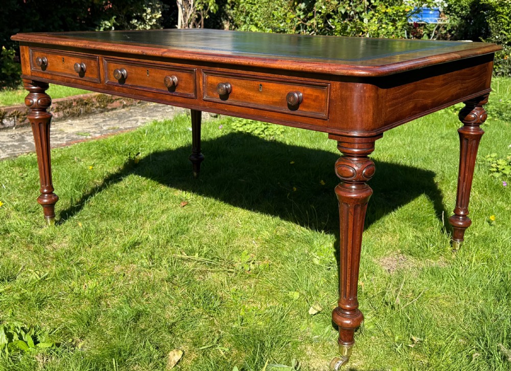 Large flame mahogany writing table