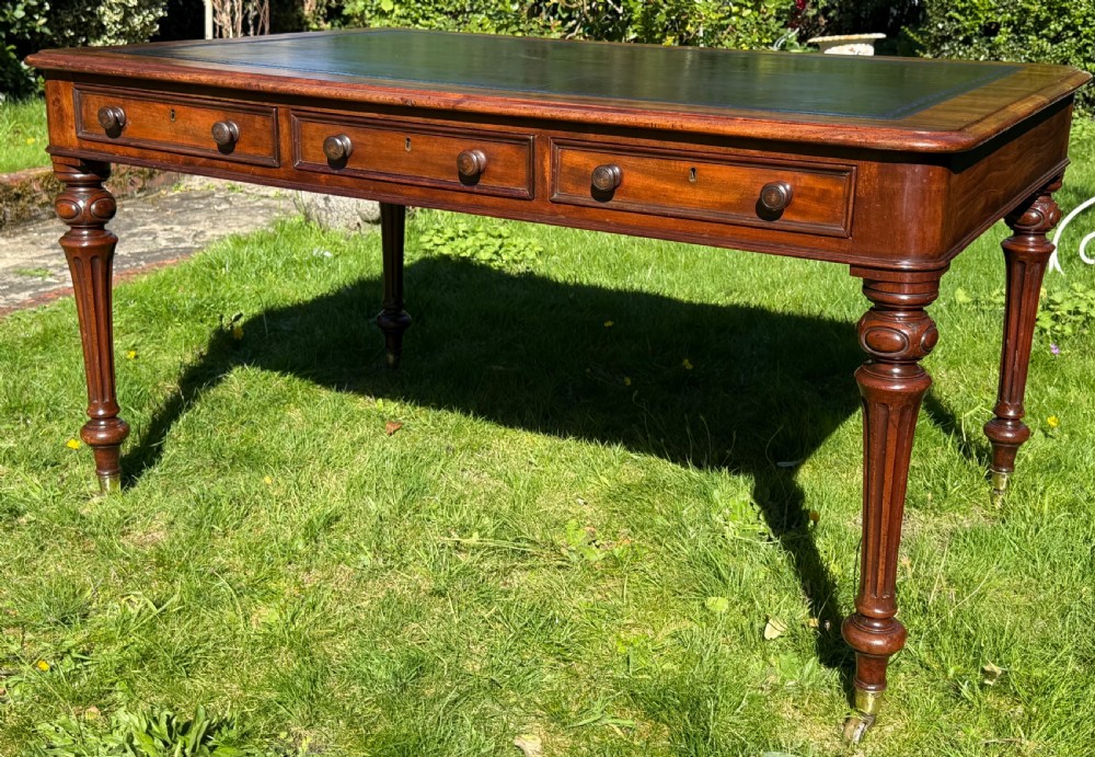 Large flame mahogany writing table View V