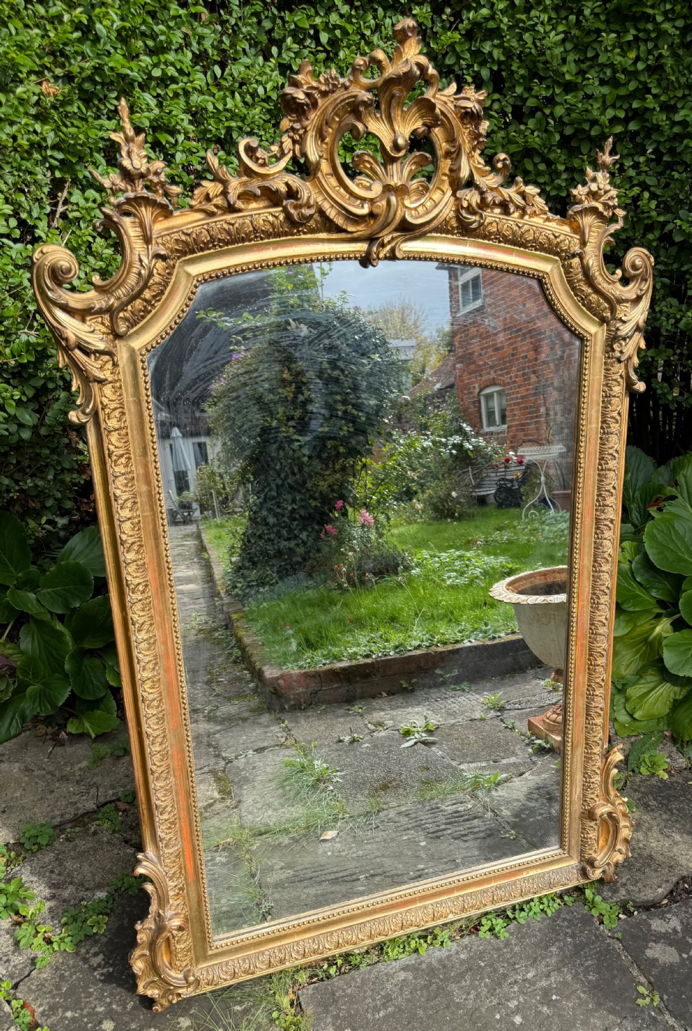 19th Century: gilt mirror in Rococo taste