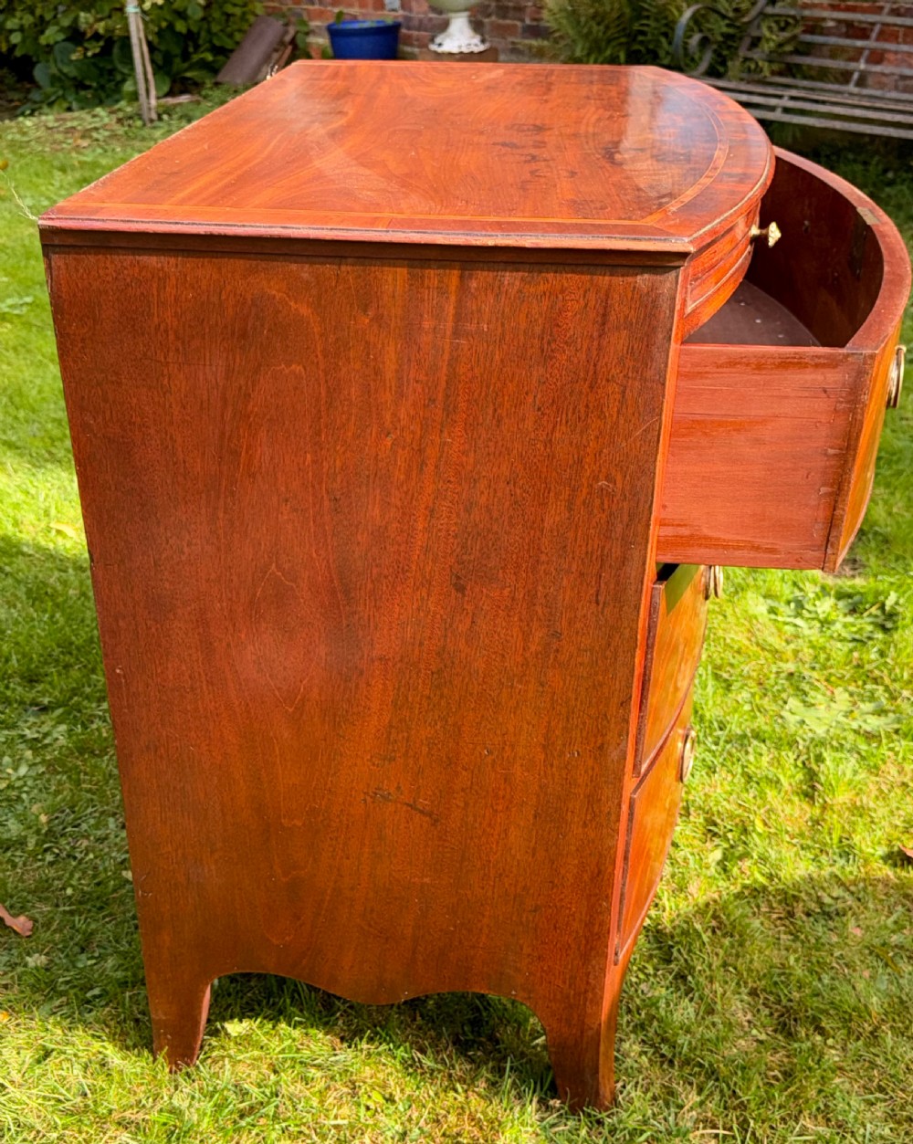 Small Regency Bow fronted chest of drawers View II