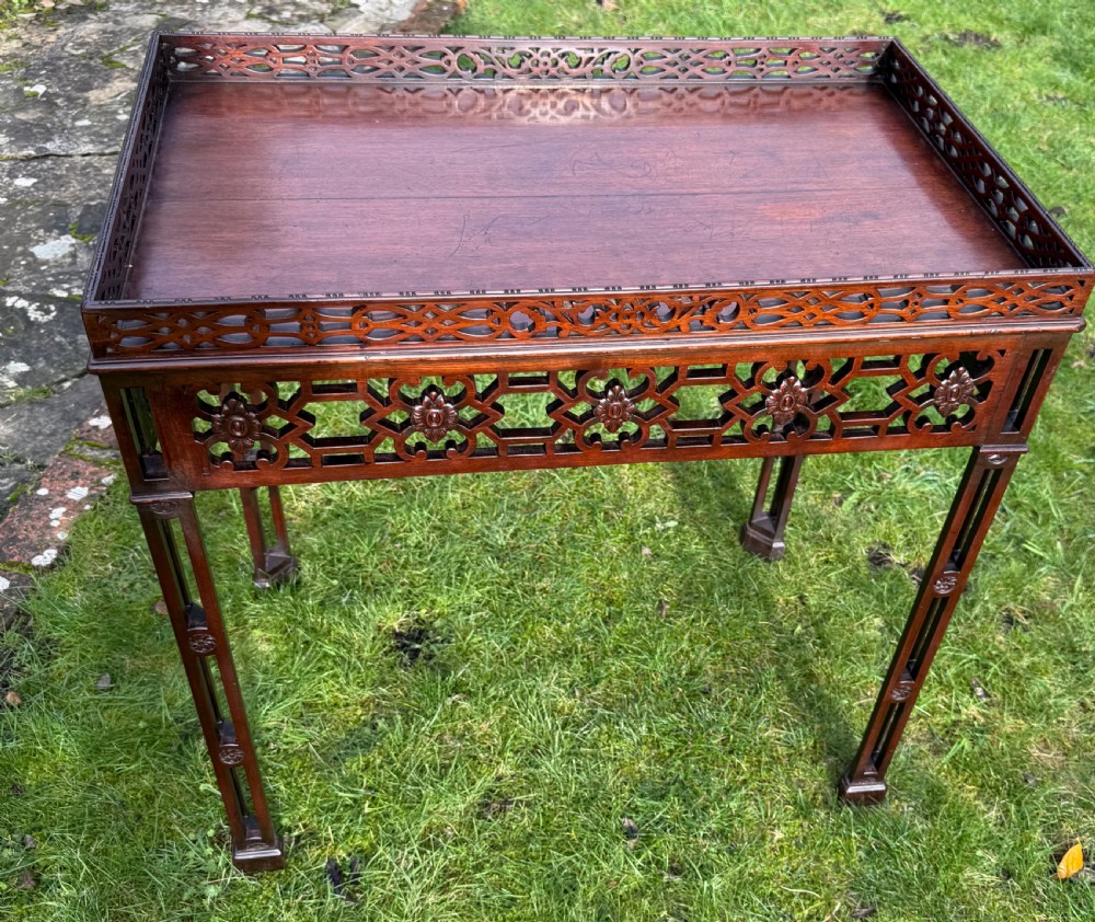 Carved fretwork silver table in mahogany 