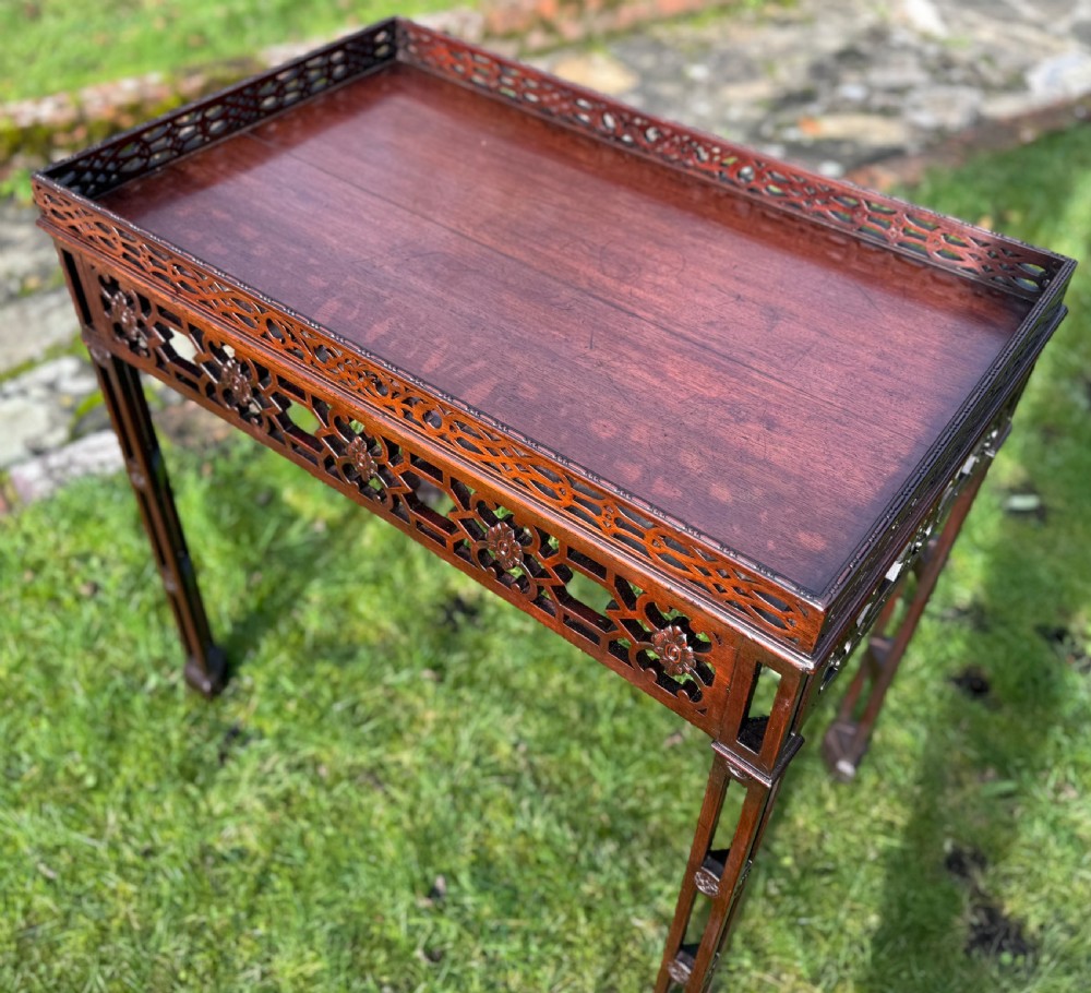 Carved fretwork silver table in mahogany  View II