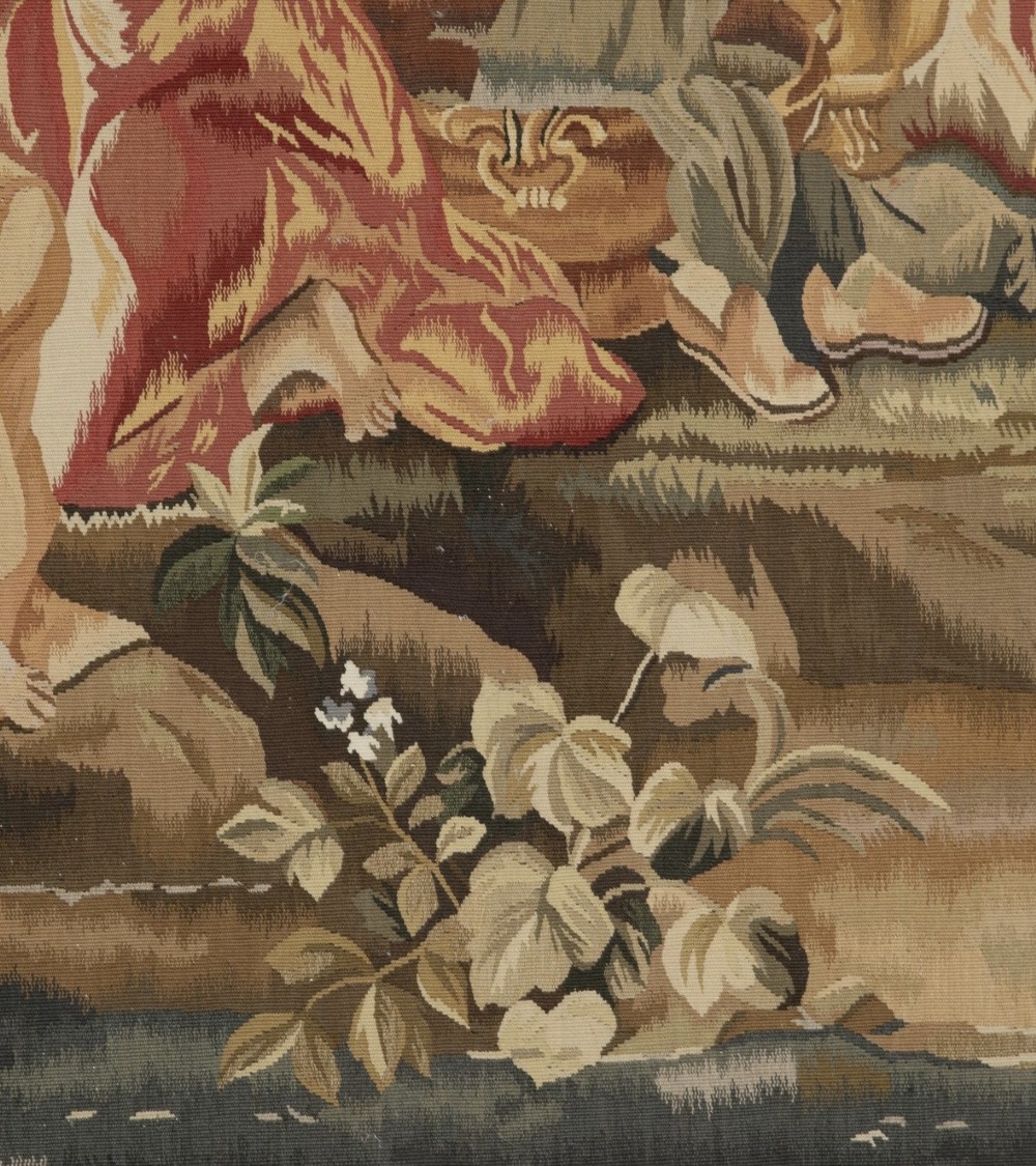 A large rectangular 19th-century French Aubusson style woven tapestry depicting figures under palm trees within a decorative foliage border. View III
