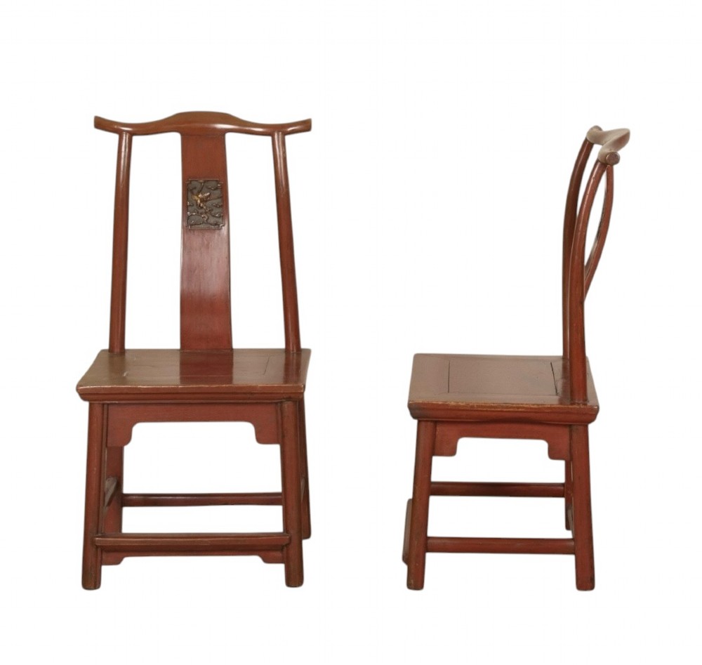 A matched pair of 19th-century Chinese side chairs featuring curved yoke top rails, carved central back splats, square timber seats, and a reddish-brown lacquered finish. View II