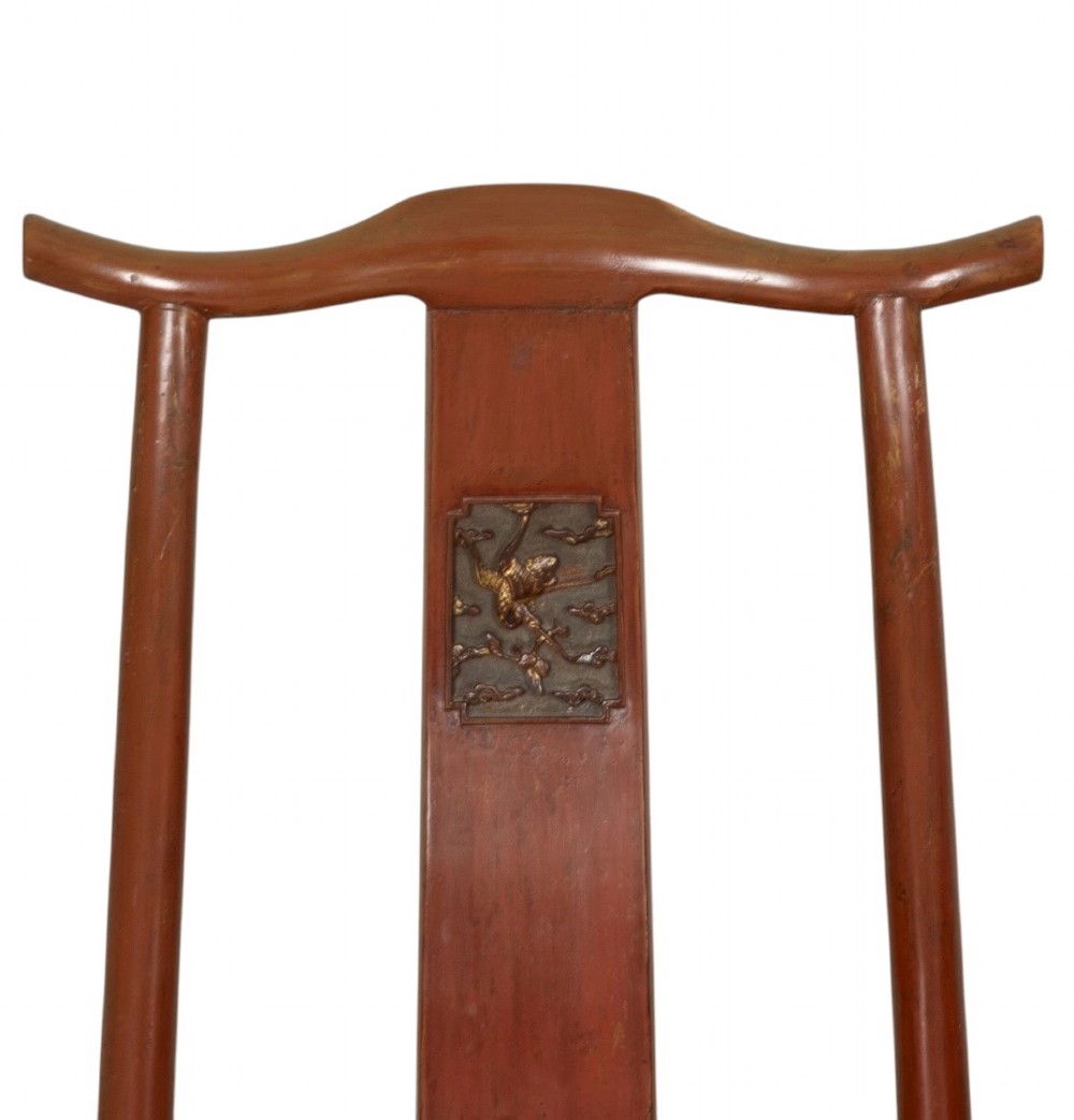 A matched pair of 19th-century Chinese side chairs featuring curved yoke top rails, carved central back splats, square timber seats, and a reddish-brown lacquered finish. View VI