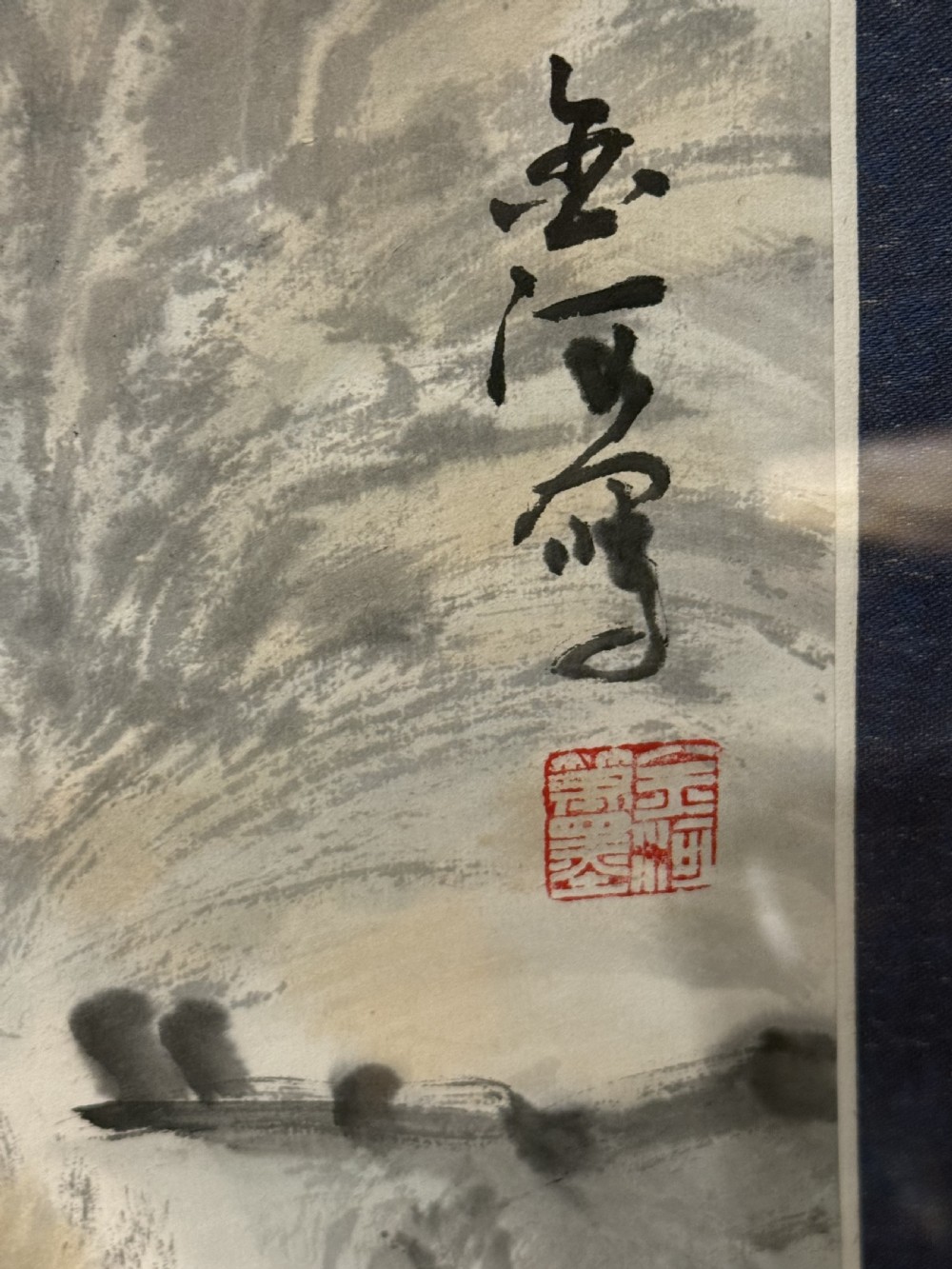 A framed Chinese scroll painting on paper mounted with blue silk, portraying a snow leopard amidst rocks and pine branches. View IV