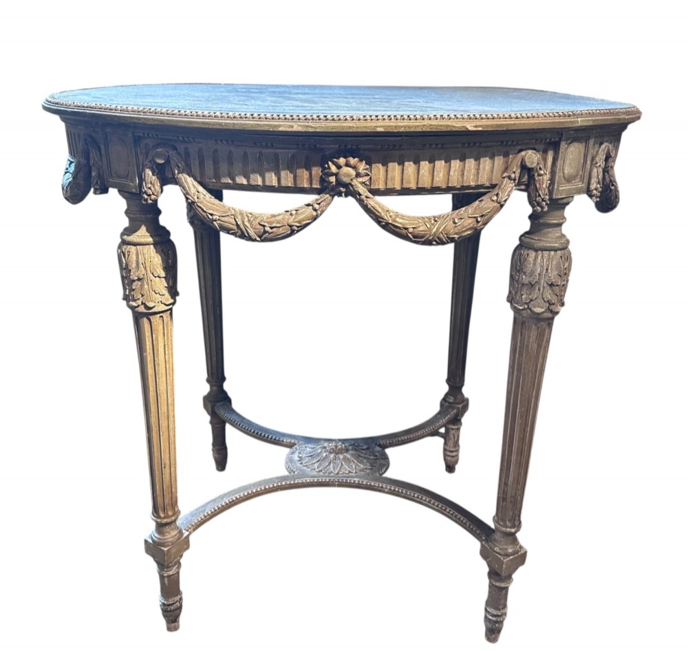 A 19th-century French Louis XVI style oval occasional table featuring a blue-green marble top, carved draped swags, fluted legs, and a central rosette stretcher. View II