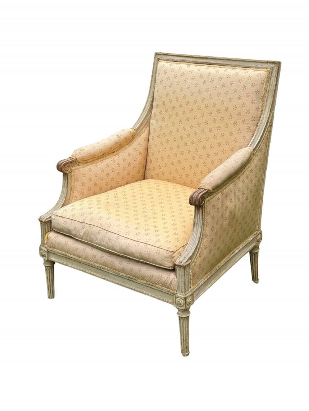 An 18th-century French Louis XVI armchair featuring a distressed grey painted wooden frame with fluted tapered legs and cream patterned upholstery. View II