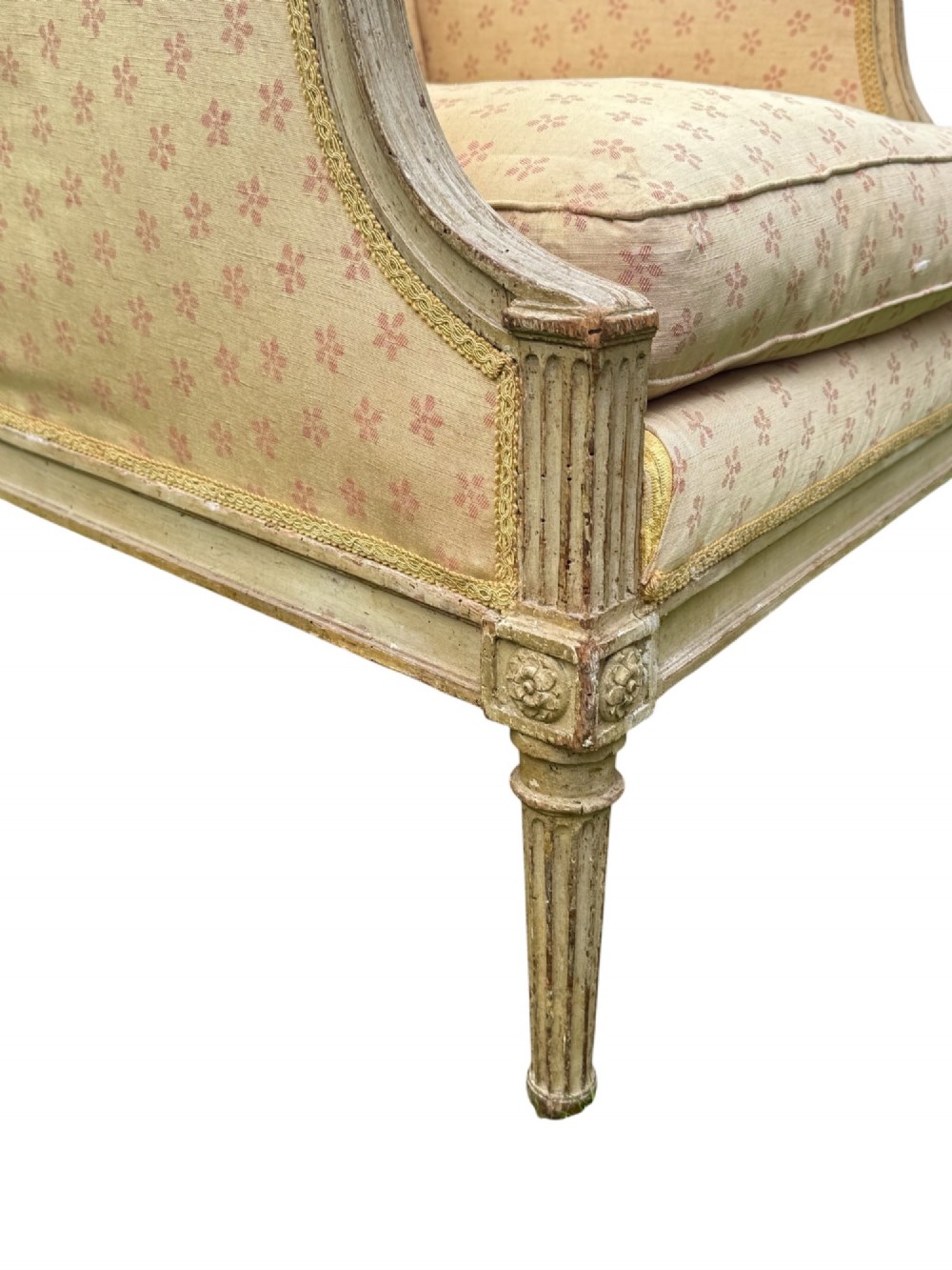 An 18th-century French Louis XVI armchair featuring a distressed grey painted wooden frame with fluted tapered legs and cream patterned upholstery. View VII