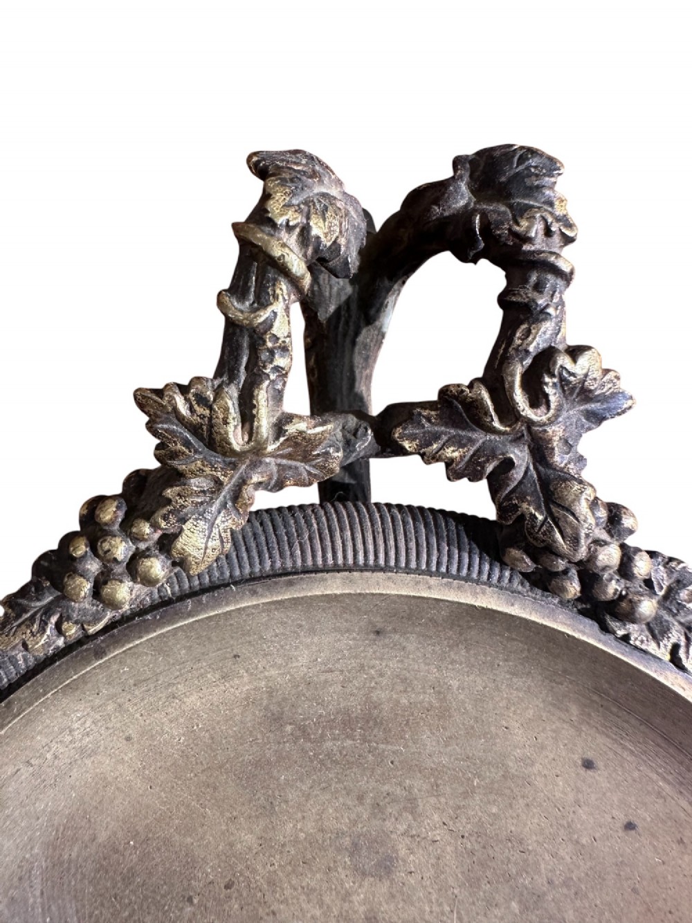 A pair of 19th-century French Empire style ormolu and bronze tazzas featuring grapevine handles and dark rectangular plinths. View IV