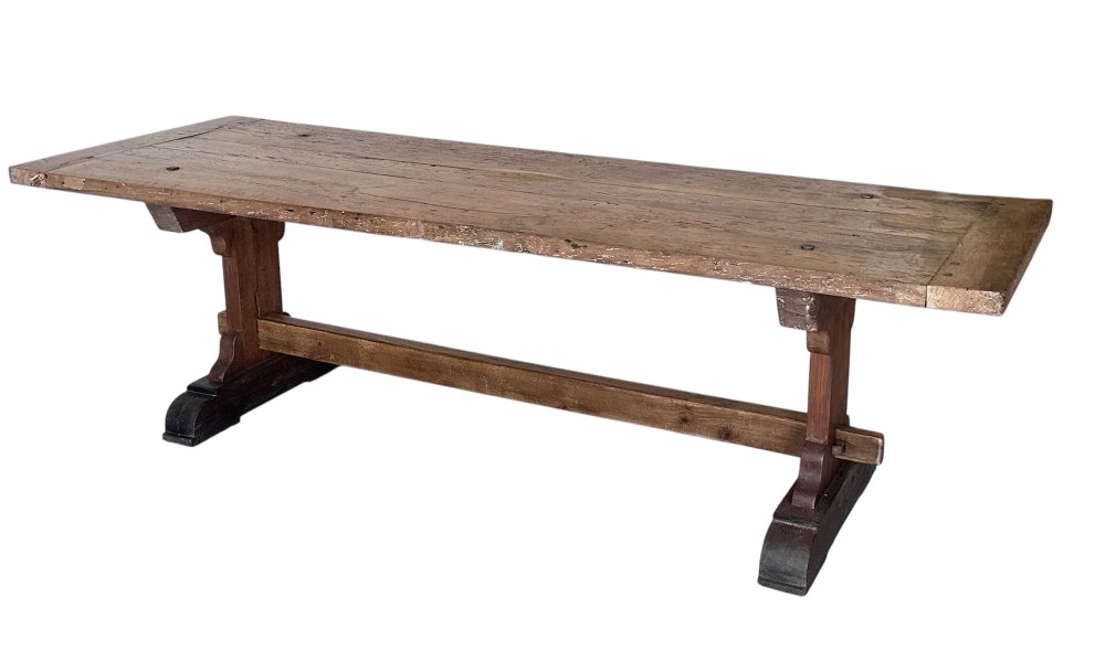 An 18th-century French refectory dining table constructed from beech timber with a solid plank top and a trestle base connected by a low stretcher. View III