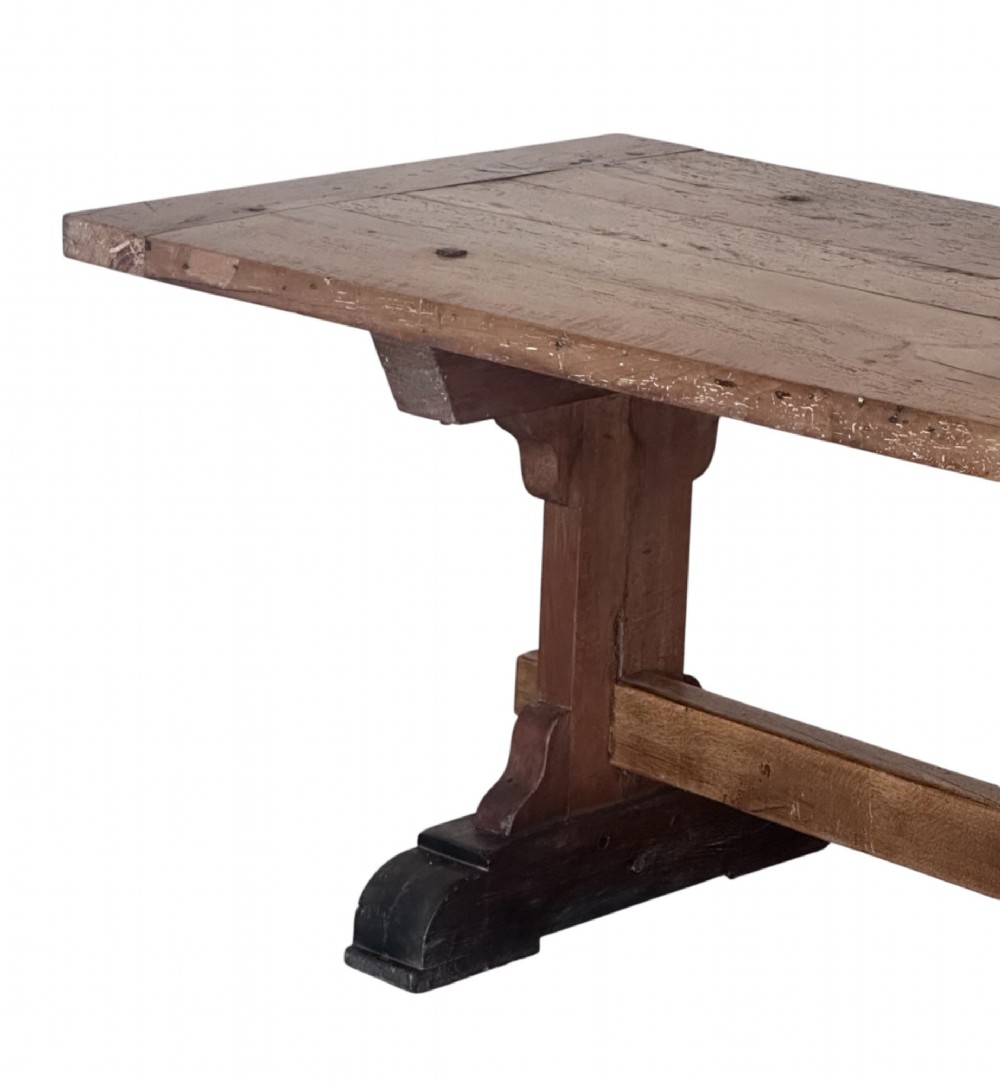An 18th-century French refectory dining table constructed from beech timber with a solid plank top and a trestle base connected by a low stretcher. View IV