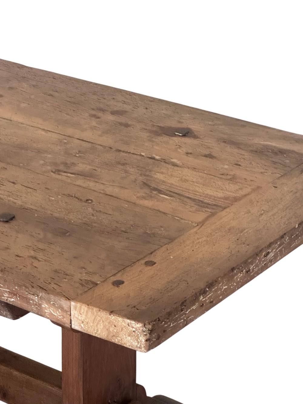 An 18th-century French refectory dining table constructed from beech timber with a solid plank top and a trestle base connected by a low stretcher. View V