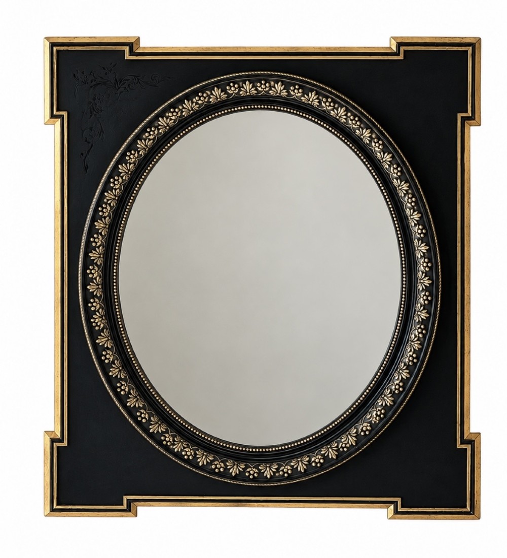 A rectangular black framed mirror with indented corners, gold leaf moulding, and a central oval mirror plate bordered by gilded floral patterns.