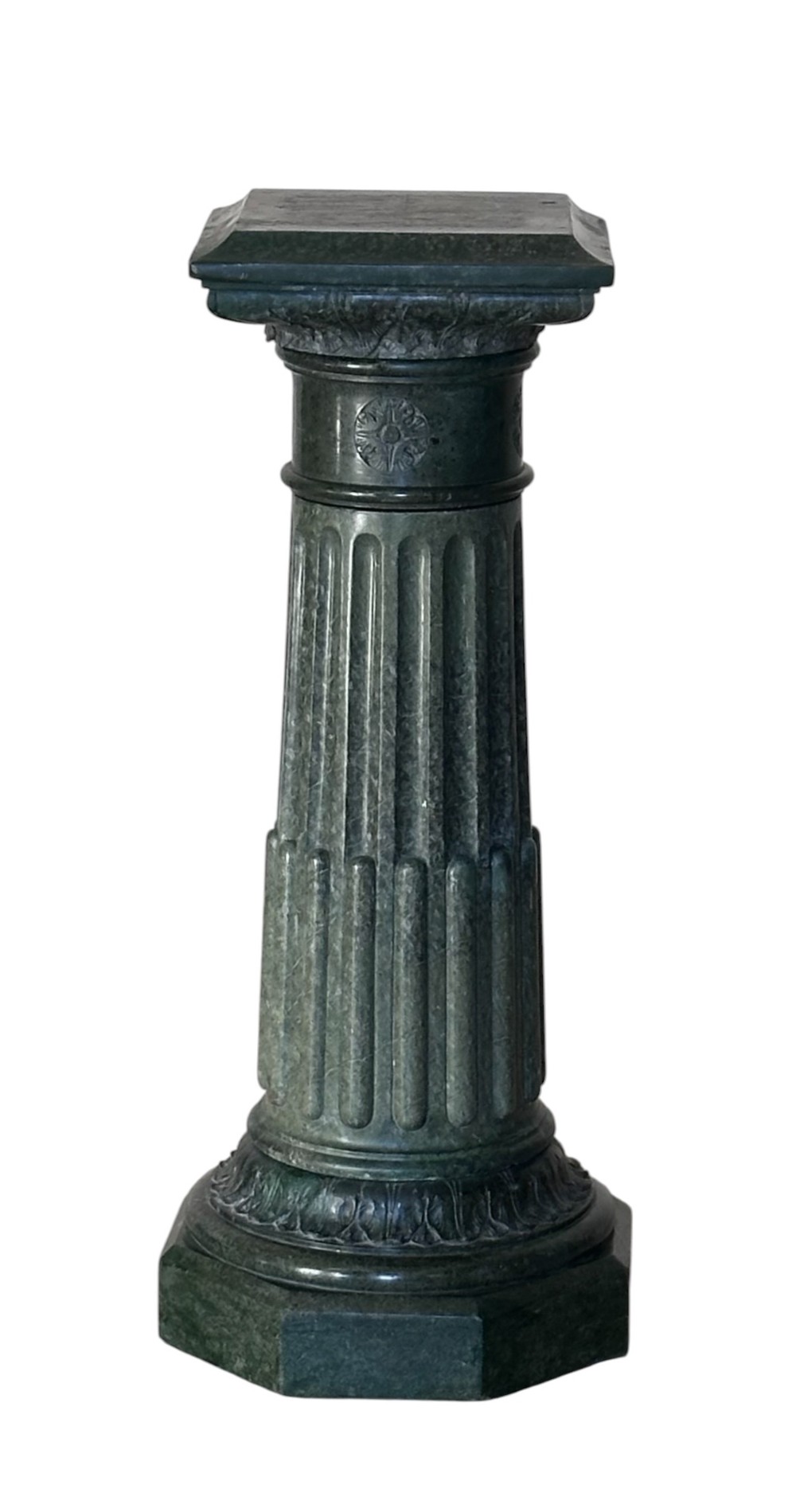 A nineteenth-century French dark green marble column featuring a fluted shaft, carved decorative detailing, and a square top display platform.