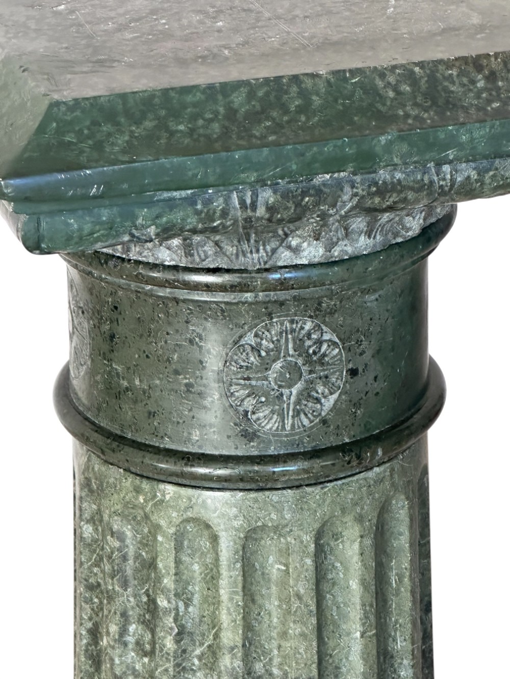 A nineteenth-century French dark green marble column featuring a fluted shaft, carved decorative detailing, and a square top display platform. View III
