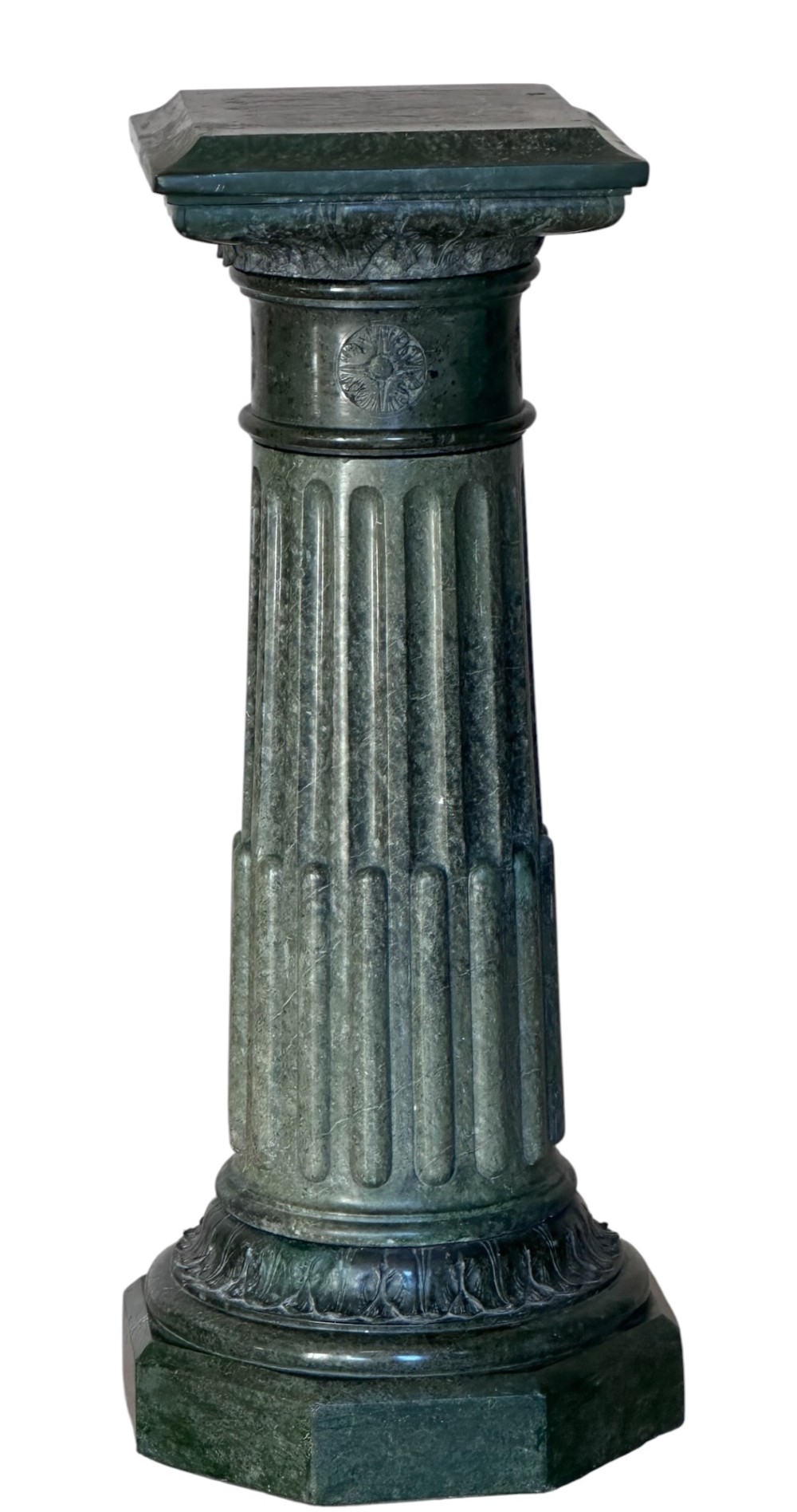 A nineteenth-century French dark green marble column featuring a fluted shaft, carved decorative detailing, and a square top display platform. View IV