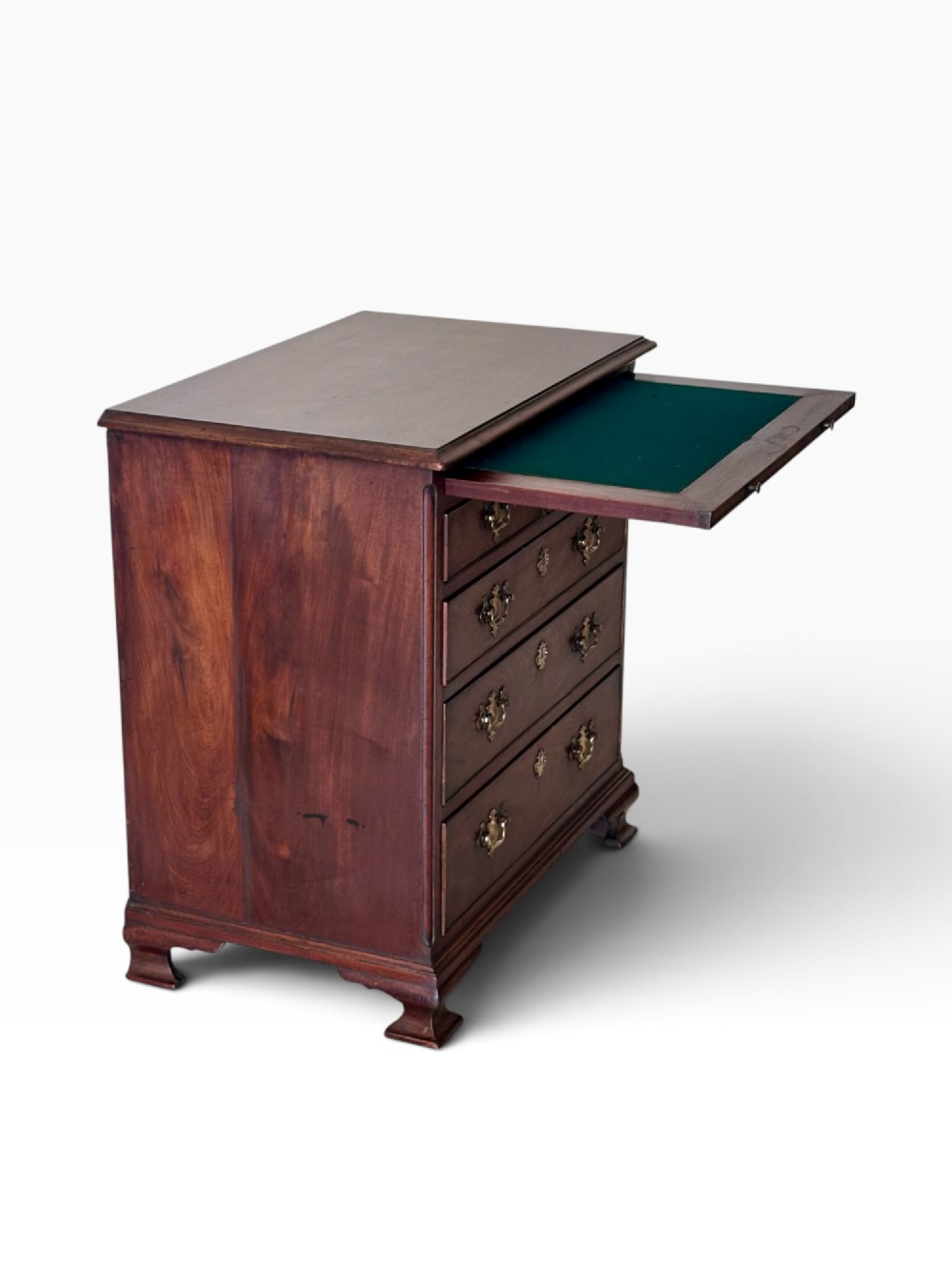 An 18th-century Georgian mahogany chest of drawers featuring a pull-out brushing slide, two short over three long drawers, brass handles, and bracket feet. View III