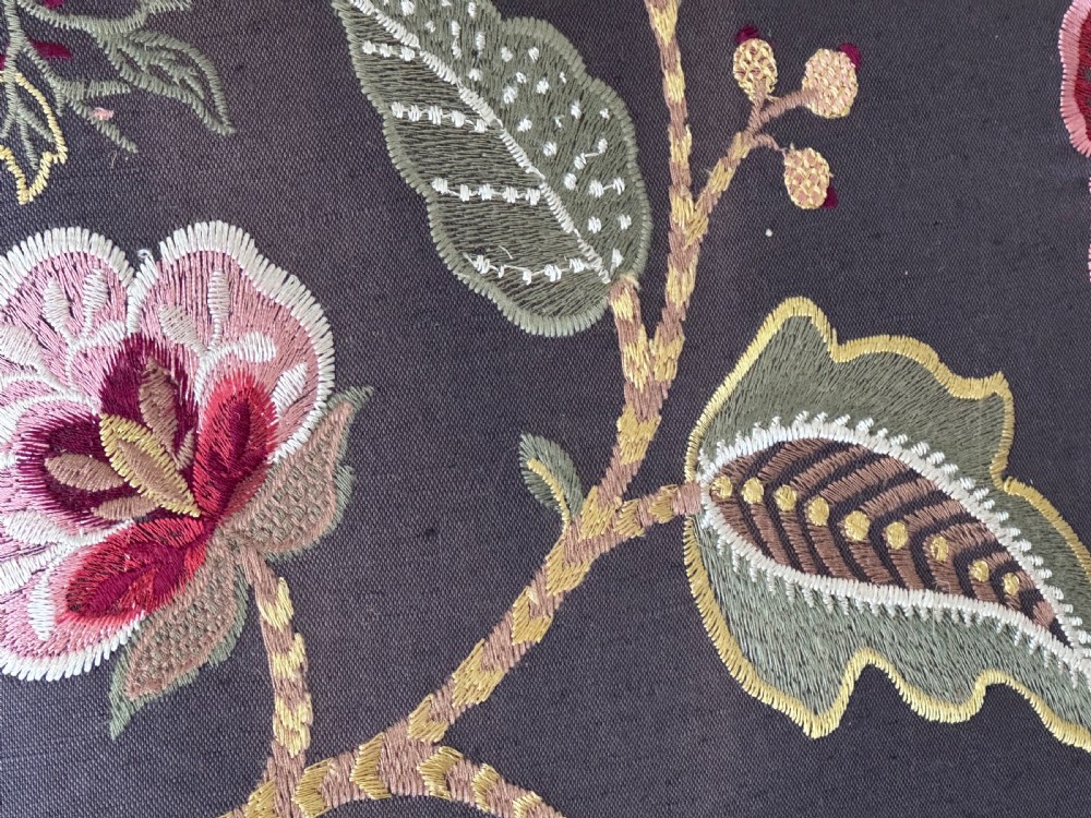 A square 19th-century William and Mary style stool featuring dark turned walnut legs, curved stretchers, and dark textile upholstery embroidered with floral motifs. View IV