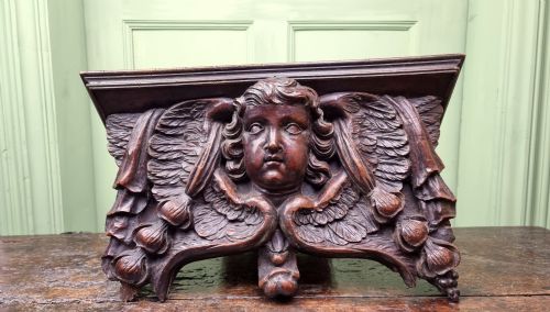 A Late 17th Century Cherub Wall Bracket.