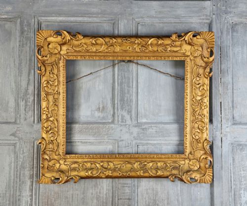 A Small 18th Century Gilt Carved Picture Frame.
