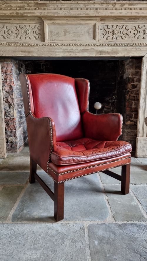 A Small Georgian Style Leather Wingchair.
