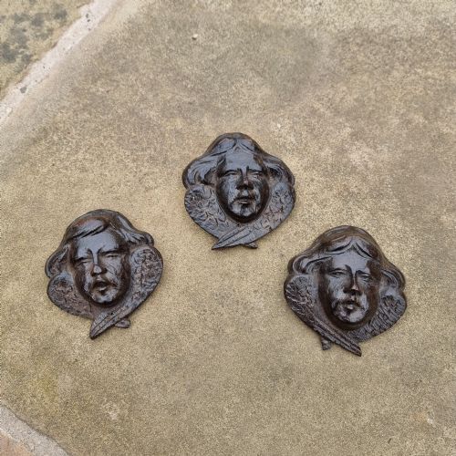 Three 17th Century Winged Heads.
