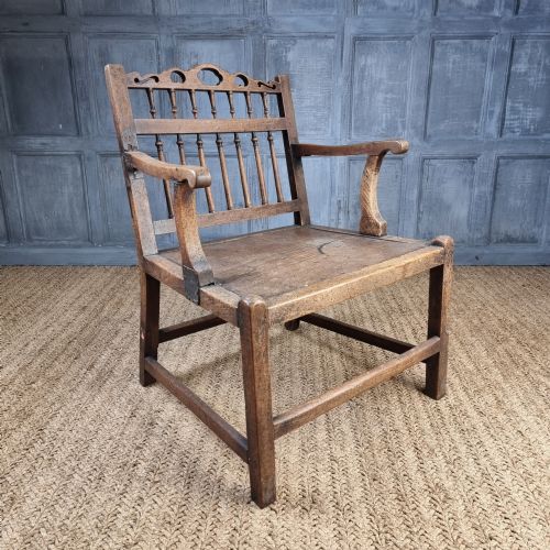 An 18th Century "Drunkards" Chair.