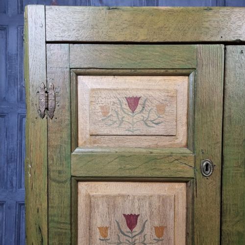 An 18th Century Green Painted Corner Cupboard. View II