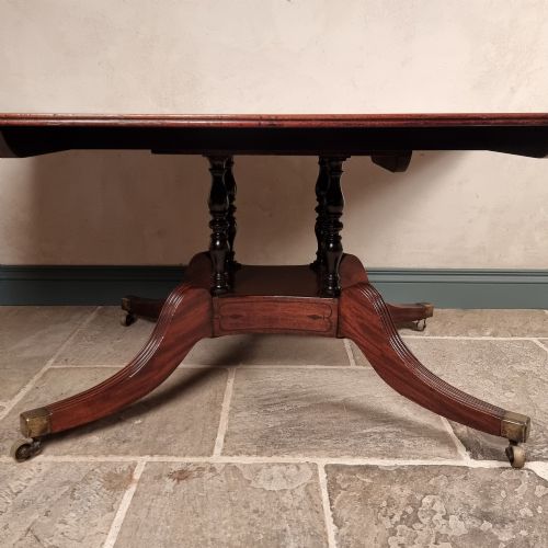 A LARGE REGENCY DINING TABLE - ADDITIONAL PHOTO 10