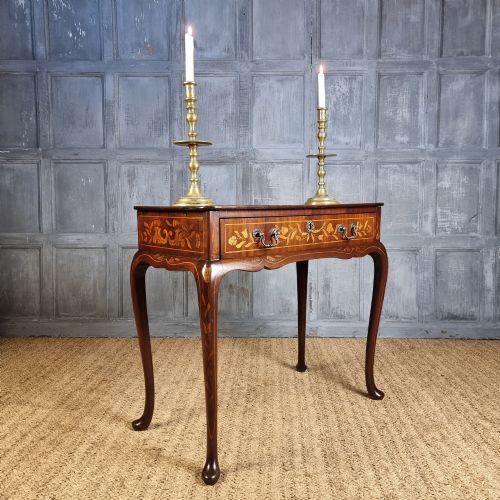 A Superb 18th Century Marquetry Center Table.