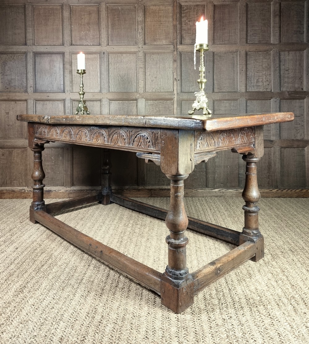 A 17th century oak refectory table. View III