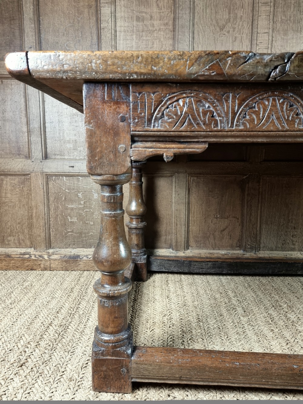 A 17th century oak refectory table. View XI