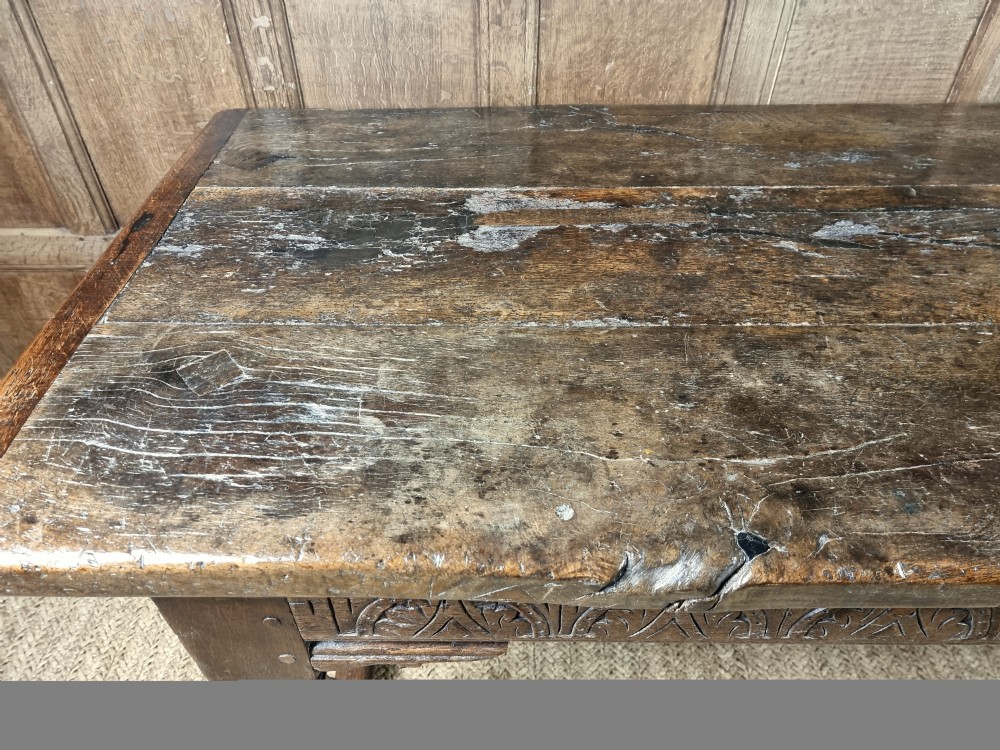 A 17th century oak refectory table. View XIII