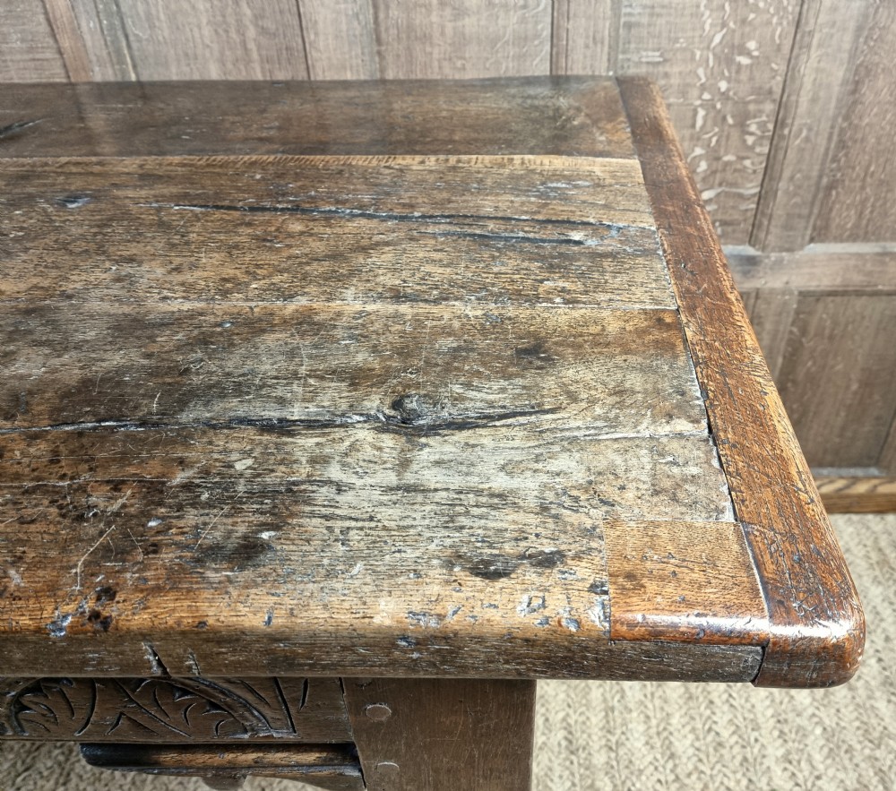 A 17th century oak refectory table. View XIV