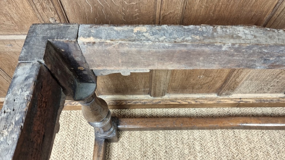 A 17th century oak refectory table. View XVIII
