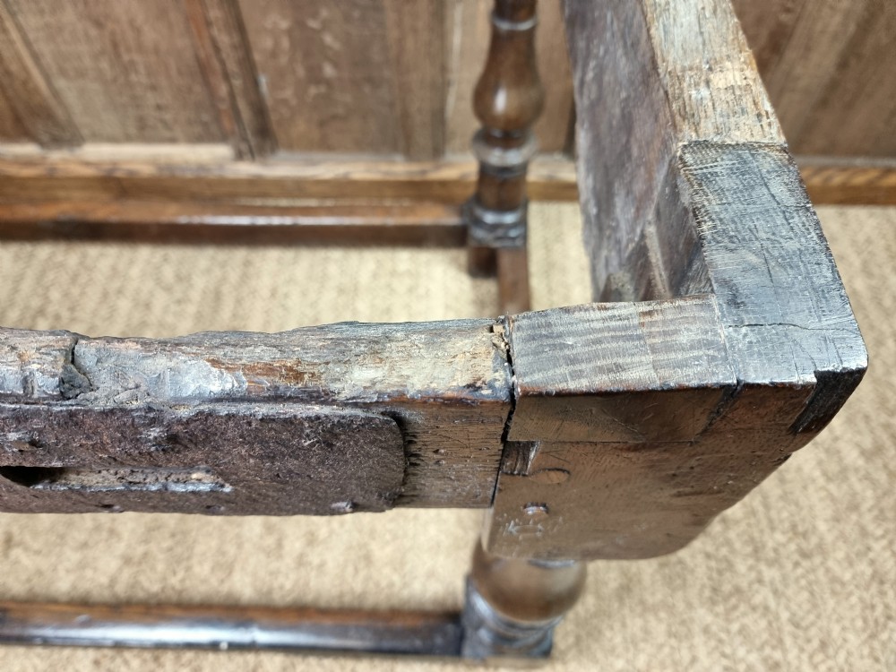 A 17th century oak refectory table. View XXI