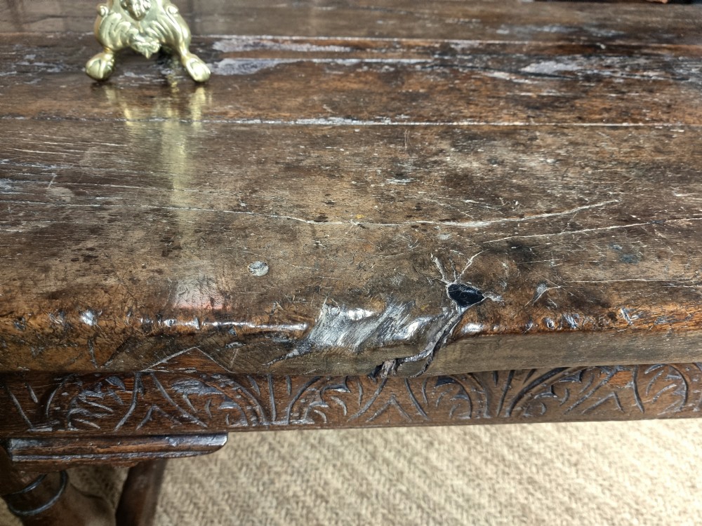 A 17th century oak refectory table. View XXX